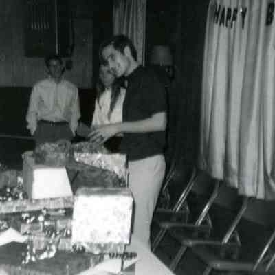 Photograph at birthday party, possibly Raul Tettamanti and Lee Shockley, Apr 1969