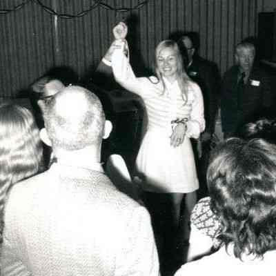 Photograph of Jan Willey, Deborah Cropper, and other unidentified people at her birthday party, Mar 1972