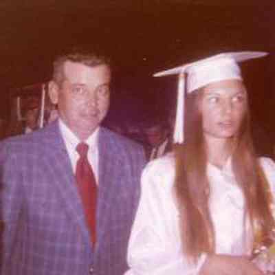 Photograph of Sandy Richardson and Roger Richardson at Snow Hill graduation, Jun 1973