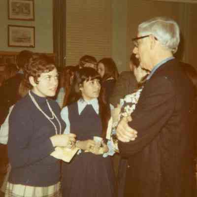 Photograph of Norma Martinez and unidentified people, unknown date