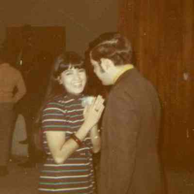 Photograph of Norma Martinez and John Hewlett at AFS Party, Mar 1970