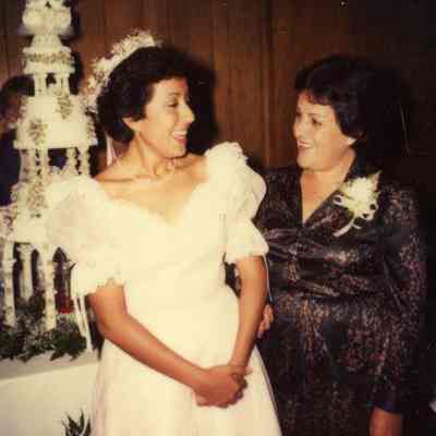 Photograph of Dina Jones and unknown woman at wedding, May 1983