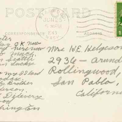 The reverse of the postcard shows it was sent in June of 1943 from L.O. Lunderson in Stanwood to his sister, Mrs. H.E. Helgeson in San Pablo, CA