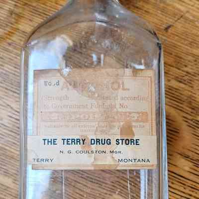 Terry Drug Store Large Wood Alcohol Bottle