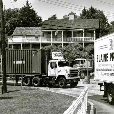 Trucks in front of Bush-Holley House C