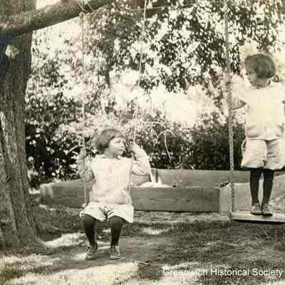 Constant and Clarissa MacRae on Tree Swings