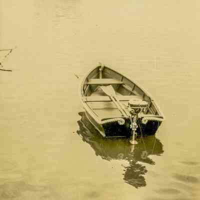 Rowboat with Outboard Motor