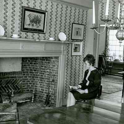 Woman by Fireplace B