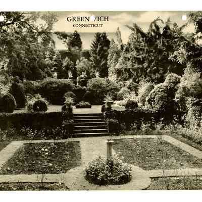 Tudor Residence with Resplendent Gardens Hemlock Drive Front