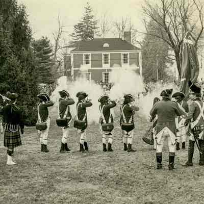 Firing Muskets During a Revolutionary War Reenactment
