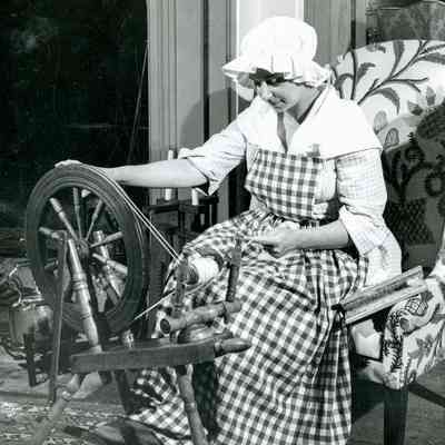 Woman at Spinning Wheel