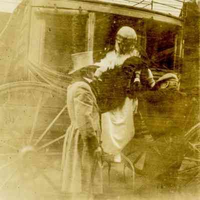 Oscar Tuthill and Alice Binney with a Carriage