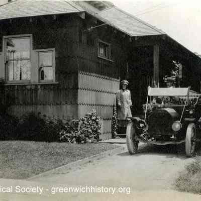 House and Car on Telegraph Avenue, Oakland, California