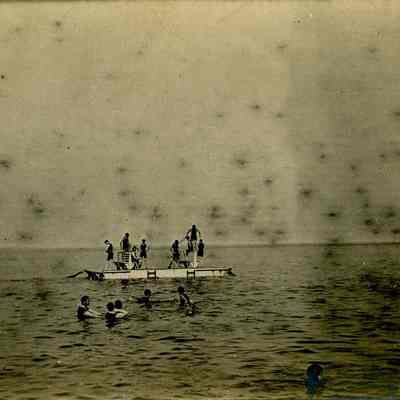 Swimmers on a Floating Dock