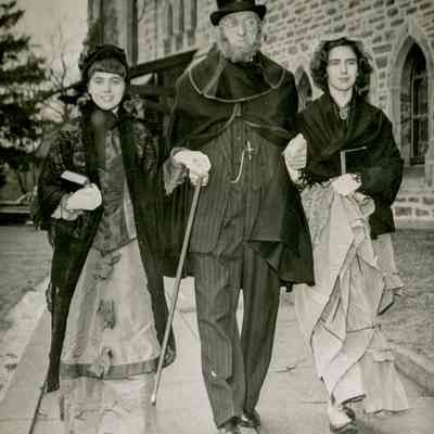Winfield Mills Escorting Two Sisters in Historical Costumes