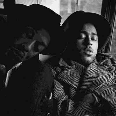 Danny Barker and Dizzie Gillespie, on the road with Cab, train c. 1940