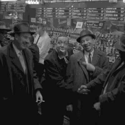 Stanley Dance, Jimmy Mundy, Scoville Browne, Hilton Jefferson and Oliver Keller (jazz fan) at Beefsteak Charlies bar, NYC