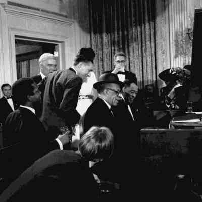 Leonard Feather, Willie “The Lion” Smith, Duke Ellington and Henry Kissinger (Duke’s 70th Birthday Party) at the White House, Washington, DC.