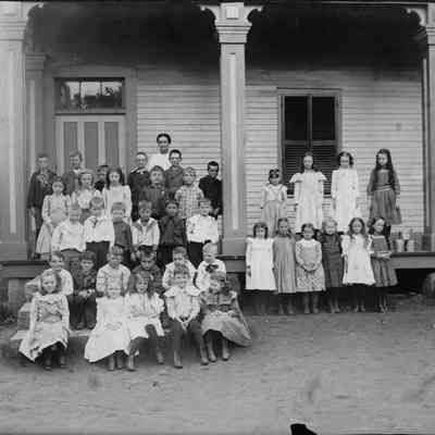 Students on the porch of the Village School 1-0066