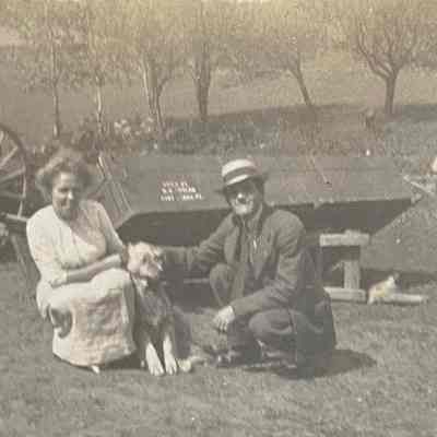 Couple posing with dog