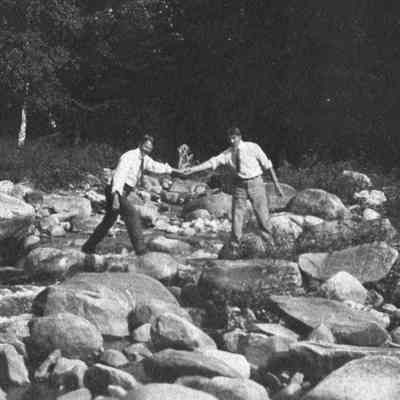 Men on rocks 5-279