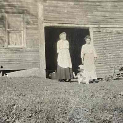 Two Women with Dog