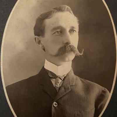 Man with handlebar moustache
