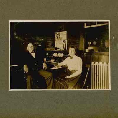 Mr. Gallanders, manager of the E. T. Russell Sardine Factory, Prospect Harbor, Maine with Genevieve Cole Colwell.
