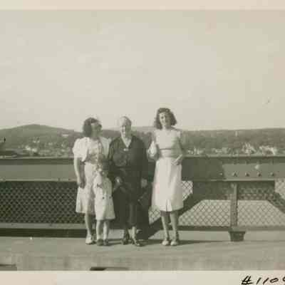 Alice Moore Peasley, Maine Seacoast Mission minister with small boy and two women.