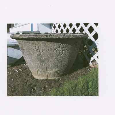 Flower pot near stairs of West Gouldsboro Union Church.