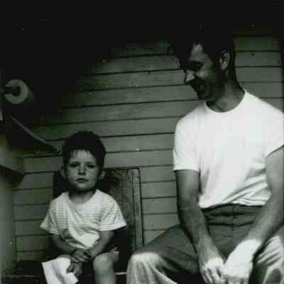 John and Gordon Workman, Sr. inside the Outhouse at the Prospect Harbor Lighthouse.