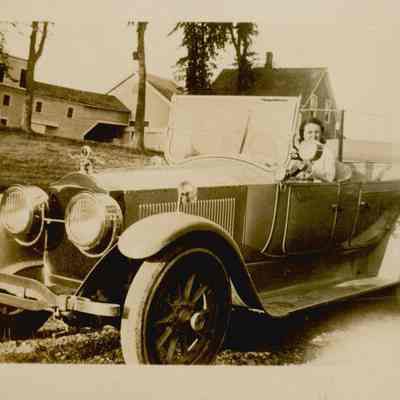 Dorothy Noyes McGee driving a car