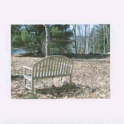 Garden Bench Facing Jones Cove. From photo collection of Hart Family private garden in West Gouldsboro, Maine.
