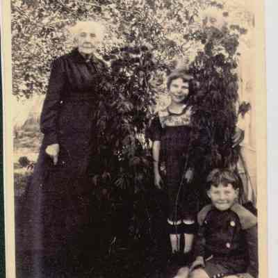 Grammie Shaw with a woman and two children.