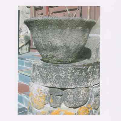 Soderholtz flower pot on stairs of West Gouldsboro Village Library (mid-view).