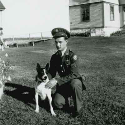 Gordon Russell Workman in front of the Prospect Harbor Lighthouse Keeper's Cottage.