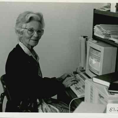 Elinor Vassey at her computer.