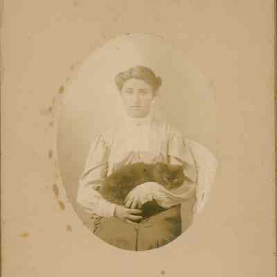 Addie Orcutt Bunker holding a cat.