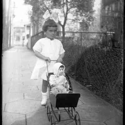Girl with doll baby in carriage/GP1.819