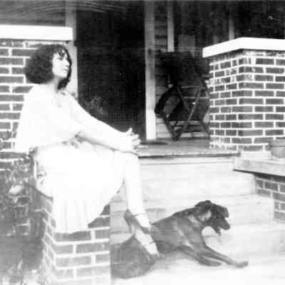 Fadtha Barket on porch, 1927.