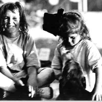 Two Girls with a Dog, 1915