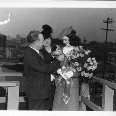 Pinning Miss Rogers by James Merrill at the launching of S.S. Elizabeth C. Bellamy on December 21, 1943 at the St. Johns River Ship Building Co. in Jacksonville, FL.