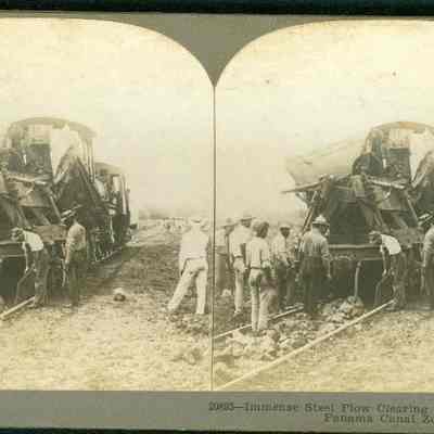 Immense Steel Plow Clearing the Track of "Spoil," Panama Canal Zone