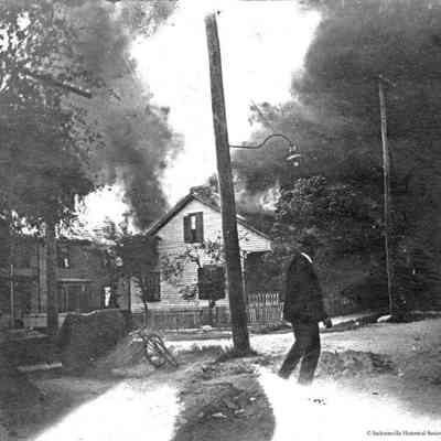 Wooden Rooftops Engulfed in Flames
