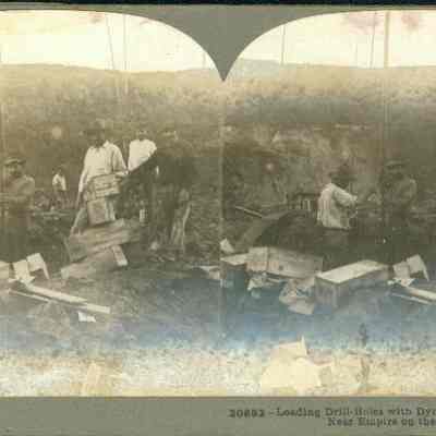 Loading Drill-Holes with Dynamite, Preparatory to Blasting, near Empire, Panama Canal Zone