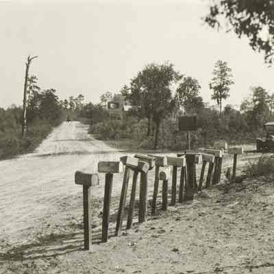 Mail Boxes and Road 1 1/2 miles past Riverview on Lem Turner Road