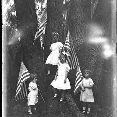 Durkee children with American flags, Empire Point/GP1.2171