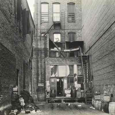 Back alley of store foot of Laura Street