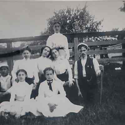 Retaliate Family group photo outside on their farm.