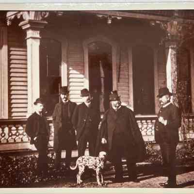 Ezra Miler and friends/guests at the entrance to the house